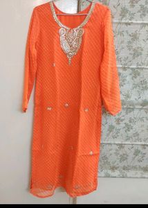 Beautiful Orange Kurta Set With Gotta Patti Work And Leheriya Print