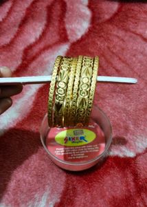 Combo Of Bangles And Pouches