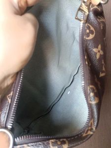 Louis Vuitton Pouch And Sling bag