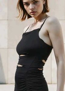 Sleek Black Cutout Bodycon Dress. Size :- M