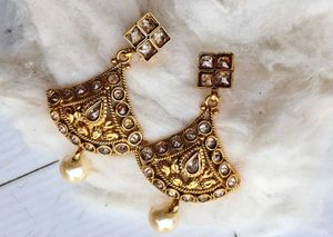 Gold-toned choker with earrings and headpiece