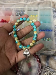 blue Beaded Bracelet with Shell Charm