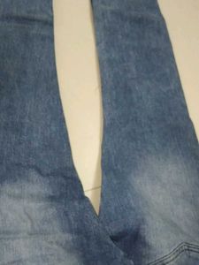 Distressed Denim Jeans