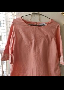 Top With Bell Sleeve And A Dress