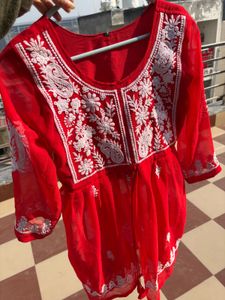 A beautiful red chikankari short kurti