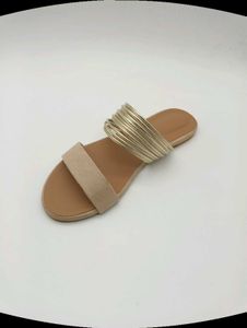 Tan And Gold Flat Sandals.
