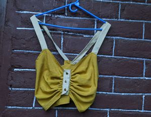 Hardly worn mustard yellow crop top .
