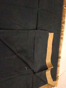 Black saree with golden sare