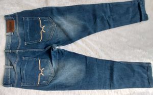 Distressed Denim Jeans