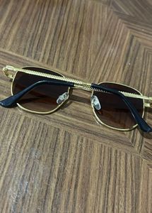 Gold Frame Oval Sunglasses