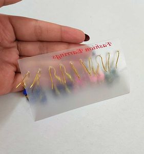 Earrings; set of 5
