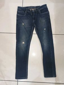 Distressed Denim Jeans