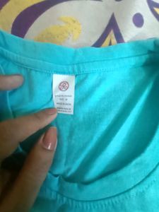 Gym top with slight stains pictures attached