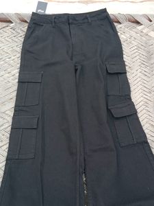 A Black Denim Jeans With 8 Pokets