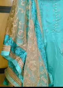 i bought this for my engagement i wore one day only and it is as new the gown is so beautiful the net sleeves and  with full embroided dupatta full size and plain leggings🤟