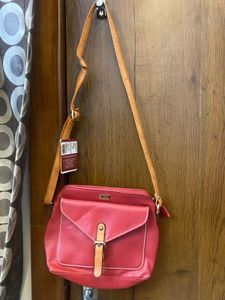 Woman’s Cherry Colored Bag