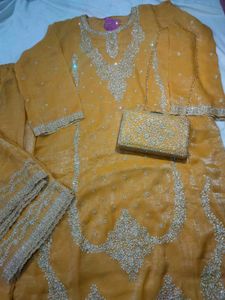 Elegant Ethnic Stitched Suit Set With Hand Purse