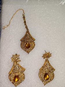 Elegant Gold Toned Drop Earrings and Maang Tika