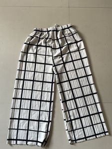 Stretchable White &amp;Black Trousers