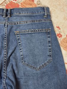 Ripped Knee Denim Jeans