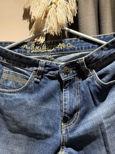 Ripped Blue Denim Jeans