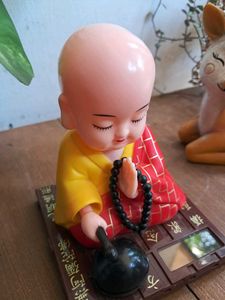 Solar Powered Buddha Moving Head And Hand