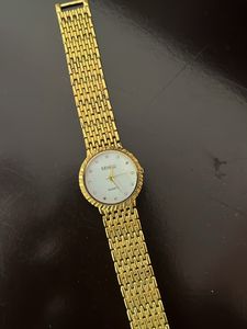 Quartz Ladies Golden Metal Strap Watch