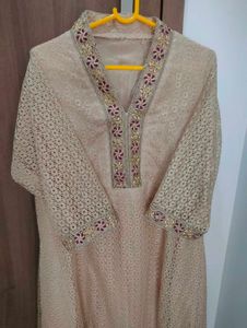 Elegant Beige Embroidered Kurti