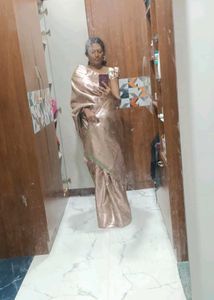A Beautiful Light Green With Pink Shade Silk Saree