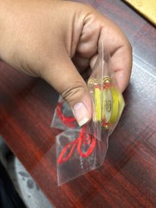 Pack Of 2 Resin Rakhi With A Money Holder