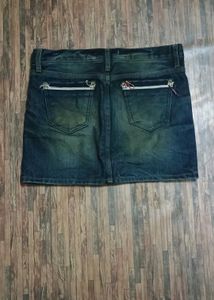 Dark wash denim mini skirt