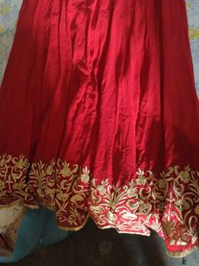 a good conditioned red embroidered gown or frock s