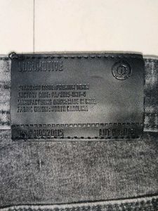 Ripped Gray Wash Jeans