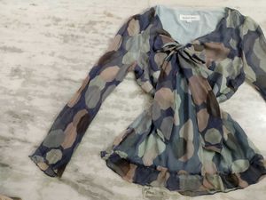 Stylish Top with Tie Detail.