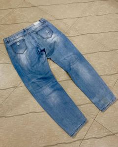 Light Blue Distressed Denim Jeans