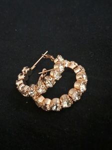Pair of earring with gold touch and stone