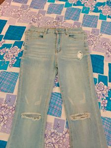 Ripped Bell Bottom Jeans