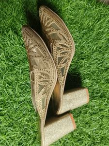 Woman Golden Heels