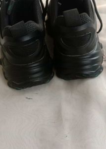black chunky sole shoe