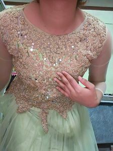 Heavy Embroidered Net Party Wear Long Gown With Du