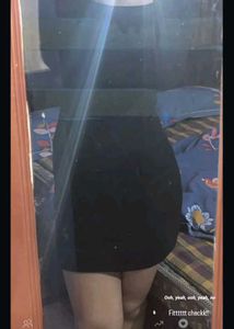 a black full sleeve bodycon dress