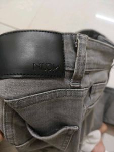 Grey Denim Jeans.     (Size- Waist 28. Length 30)