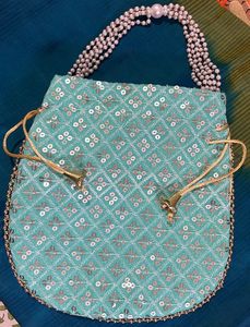 Complete Your Traditional Look With This Bag!!