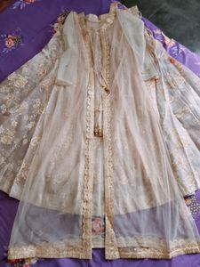 Lehenga With Net Full Sleeve Jacket And Blouse