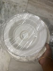 Rotating Table With Spatula For Cake Making A