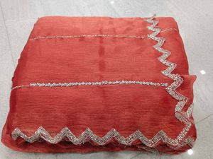 Elegant Red Saree with Silver Embellishments