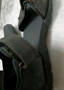 A Lightly Used Black Sandle