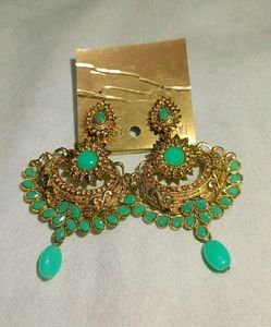 Green Dress With Bangles And Earrings
