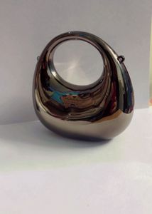 Metallic Circle Clutch