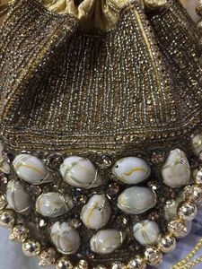POTLI SIZED GOLD POUCH